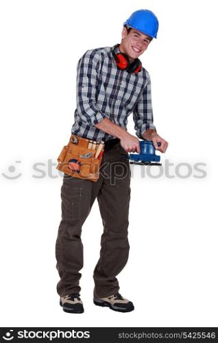 Workman with a sander