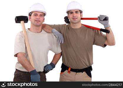 Workmen holding tools
