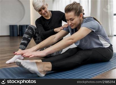 workout program trainer client doing exercises