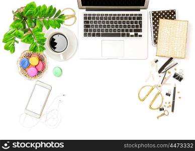 Workplace for business lady. Office supplies and laptop. Creative working. Coffee and macaroon cookies. Flat lay