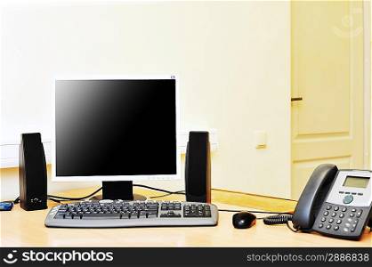 Workplace in office with monitor on work table