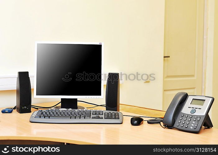 Workplace in office with monitor on work table