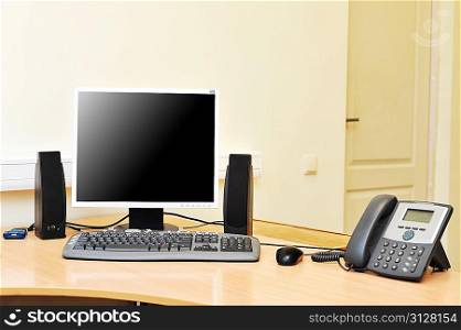 Workplace in office with monitor on work table
