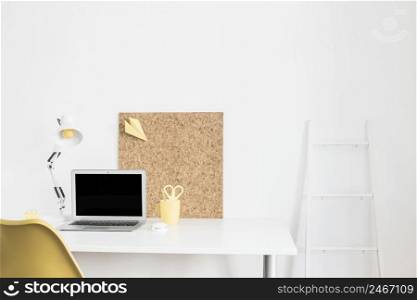 workplace with laptop home