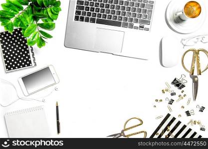 Workplace with notebook, digital phone, office supplies, diary, coffee, green plant. Creative working desk. Hero header