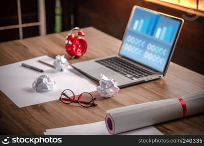 Workplace with notebook laptop Comfortable work table in office windows with sunlight. Workplace with notebook laptop 