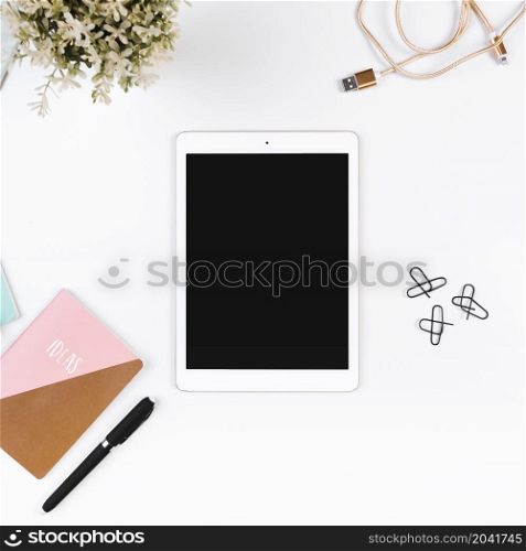 workplace with tablet stationary