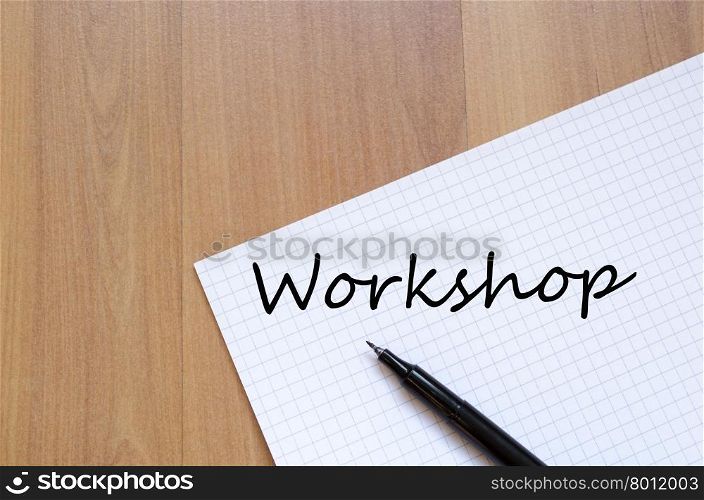 Workshop text concept write on notebook