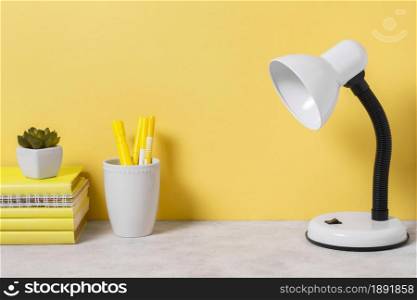 workspace arrangement with books lamp. Resolution and high quality beautiful photo. workspace arrangement with books lamp. High quality and resolution beautiful photo concept