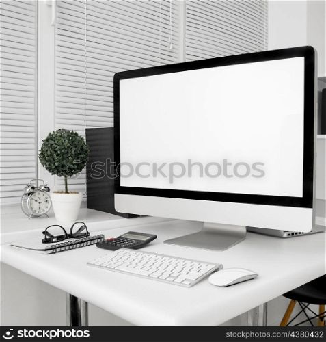 workspace with computer screen keyboard