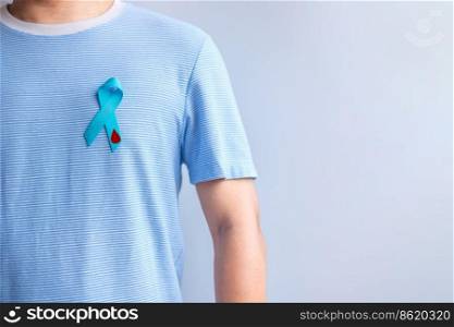 World Diabetes day Awareness month, Blue Ribbon with blood drop shape for supporting people living, prevention and illness. Healthcare, prostate cancer day concept