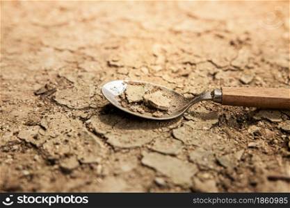 World Food Problem Concept. Environmental Impact. Global Issues in Agricultural Food Production. Cracked Soil, Desertification, Water, Pollution, Energy and Climate Change