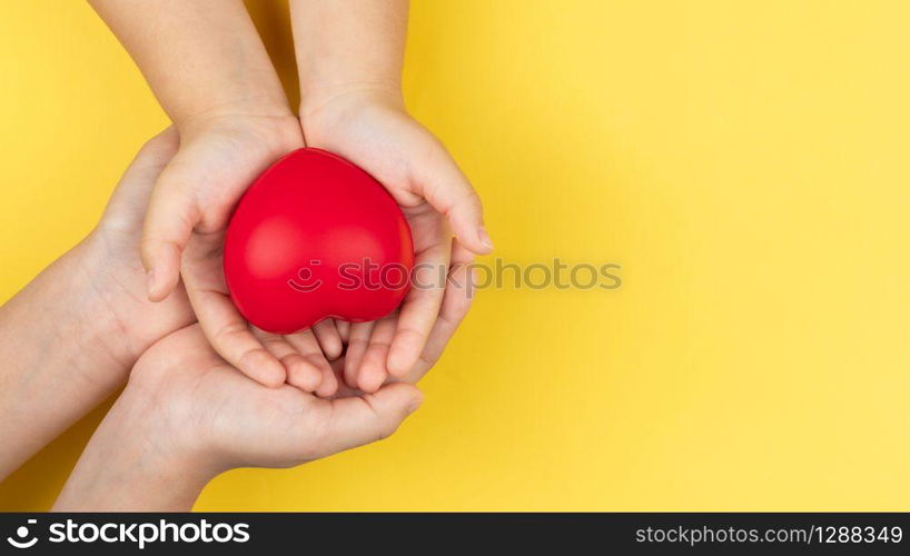 world health day, adult and child hands holding red heart, healthcare, love and family insurance concept