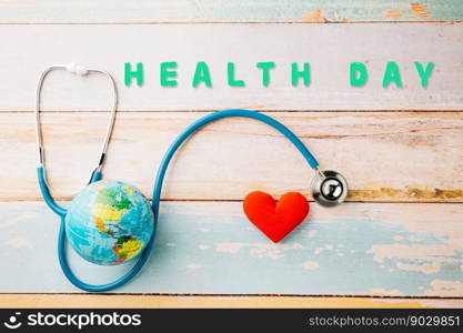 World Health Day. Yellow doctor stethoscope and world globe with Red heart shape on wooden background with copy space, Save world day, Green Earth Environment, Healthcare and medical concept