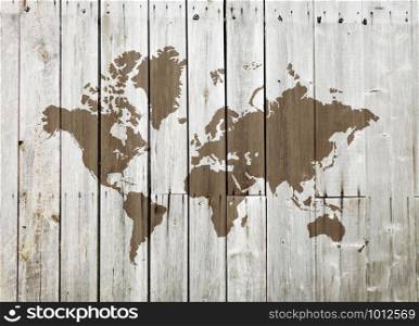 World map on a vintage wooden wall. World map on a wooden wall