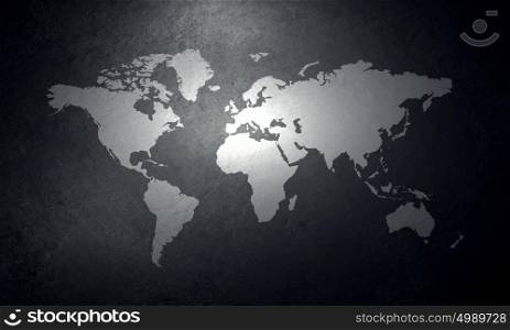 World map on concrete wall. Background image of world map on concrete wall