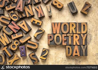 world poetry day - word abstract in vintage letterpress wood type printing blocks