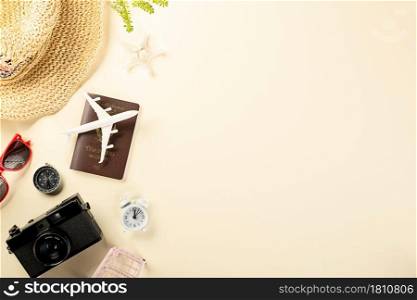World Tourism Day, Top view flatly model plane and camera, Happy holiday accessory beach trip travel vacation, summertime studio shot isolated pastel background with copy space for text
