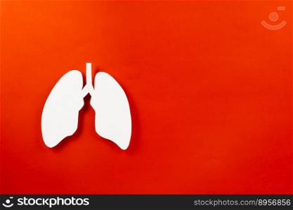 World tuberculosis day. Lungs paper cutting decorative symbol on red background, copy space, concept of world TB day, no tobacco, banner background, respiratory, lung cancer awareness, 24 March