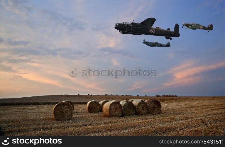 World War 2 RAF airplanes floying over lovely sunset golden hour landscape of hay bales in field in English countryside