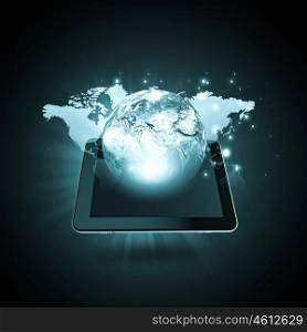 Worldwide media technologies. Global connection concept with tablet pc and digital Earth planet