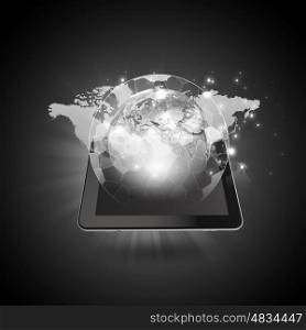 Worldwide media technologies. Global connection concept with tablet pc and digital Earth planet