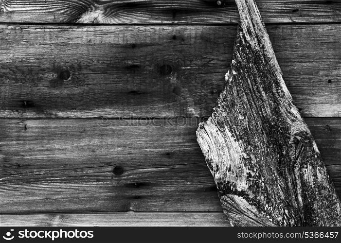 Worn wooden background with old boat&rsquo;s rudder