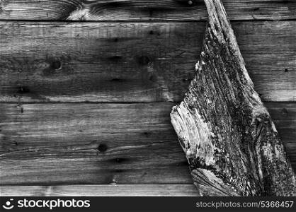 Worn wooden background with old boat&rsquo;s rudder
