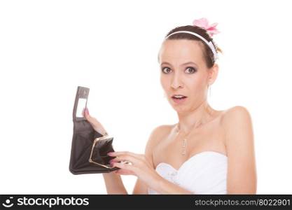 Worried bride with empty wallet. Young girl holding purse looking for money cash. Wedding expenses costs, expenditure. Finance concept. Woman in white wedding dress isolated on white background.