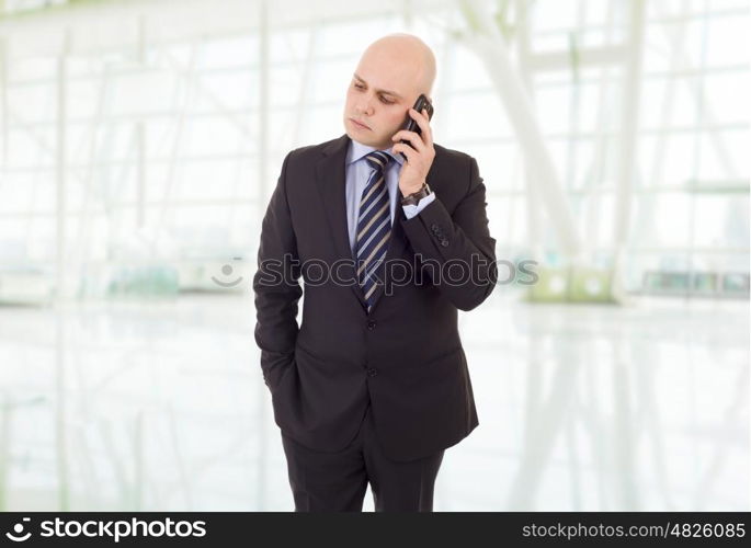 worried business man on the phone, at the office