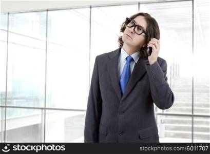 worried business man on the phone at the office