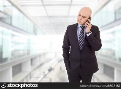 worried business man on the phone, at the office