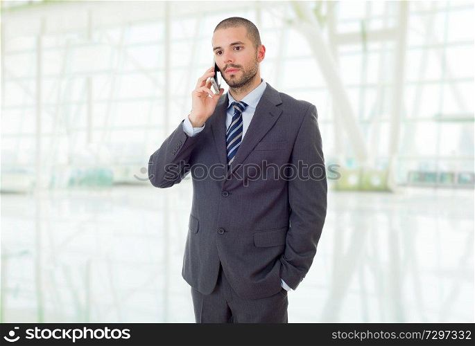 worried business man on the phone, at the office