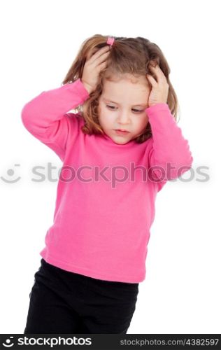 Worried little girl in pink isolated on a white background
