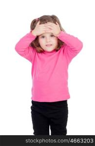 Worried little girl in pink isolated on a white background