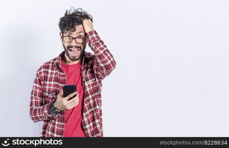 Worried man clutching his head holding cellphone, Worried person with cellphone holding his head on isolated background, Bad news concept on cellphone