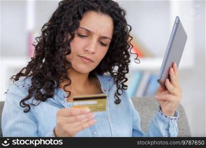 worried shopper buying online with credit card