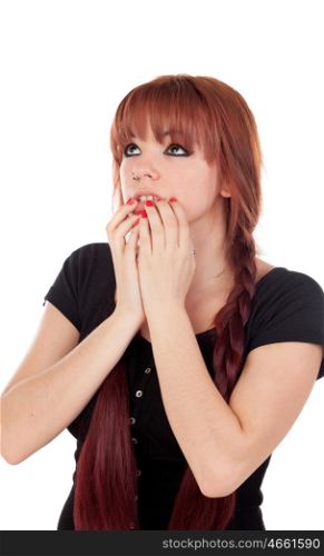 Worried teenage girl dressed in black with a piercing isolated on white background