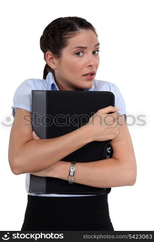 Worried woman holding folder