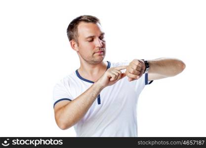 Worrier man running out of time looking his watch isolated on a white background