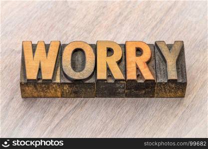 worry word abstract in vintage letterpress wood type