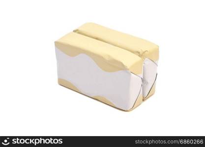 Wrapped butter sticks isolated on a white background