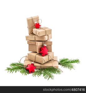 Wrapped gift boxes with Christmas decoration on white background