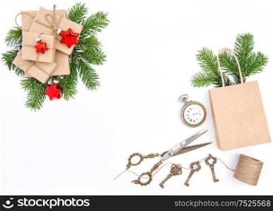 Wrapped gift boxes with Christmas decoration on white background. Top view. Flat lay