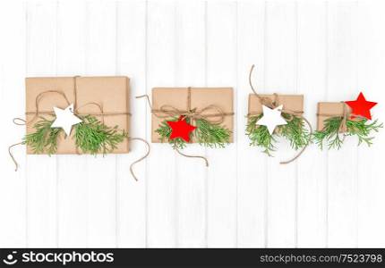Wrapped gifts with christmas decoration on bright background