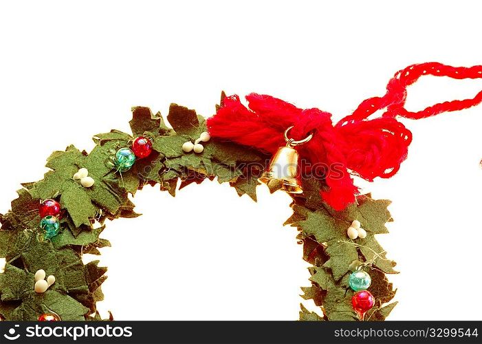 Wreath decorated with a small golden bell