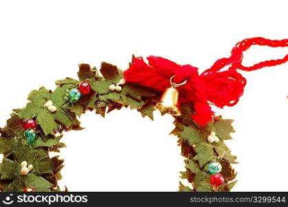 Wreath decorated with a small golden bell