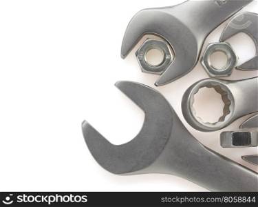 wrench and nut tool on white background