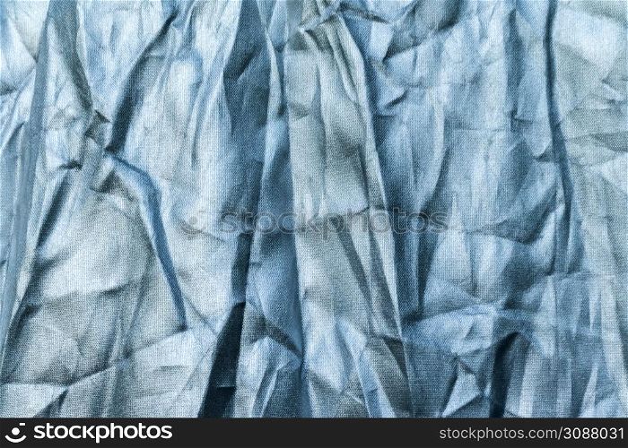 Wrinkled silver metallic fabric almost foil look