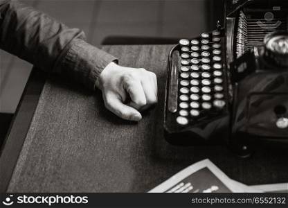 writer at the old typewriter